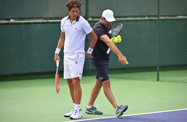 a photo of coaching tennis